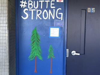 A wall painted with the words Butte Strong